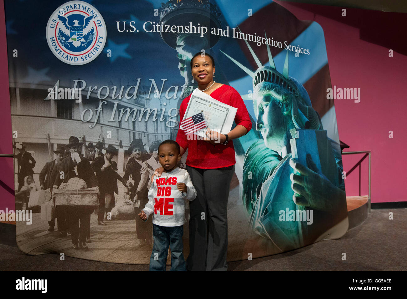 New United States citizen poses with her son and her citizenship certificate after naturalization ceremony in San Antonio, Texas Stock Photo