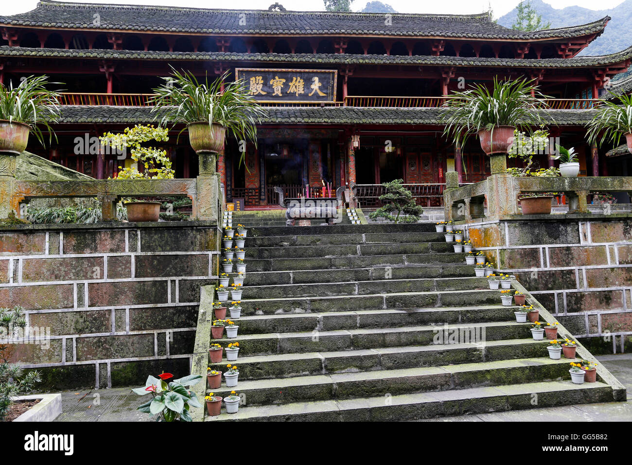 Stairway leading to the praying hall in a Buddhist temple on Mt. Emei (Emeishan), Leshan, Sichuan, China. Stock Photo