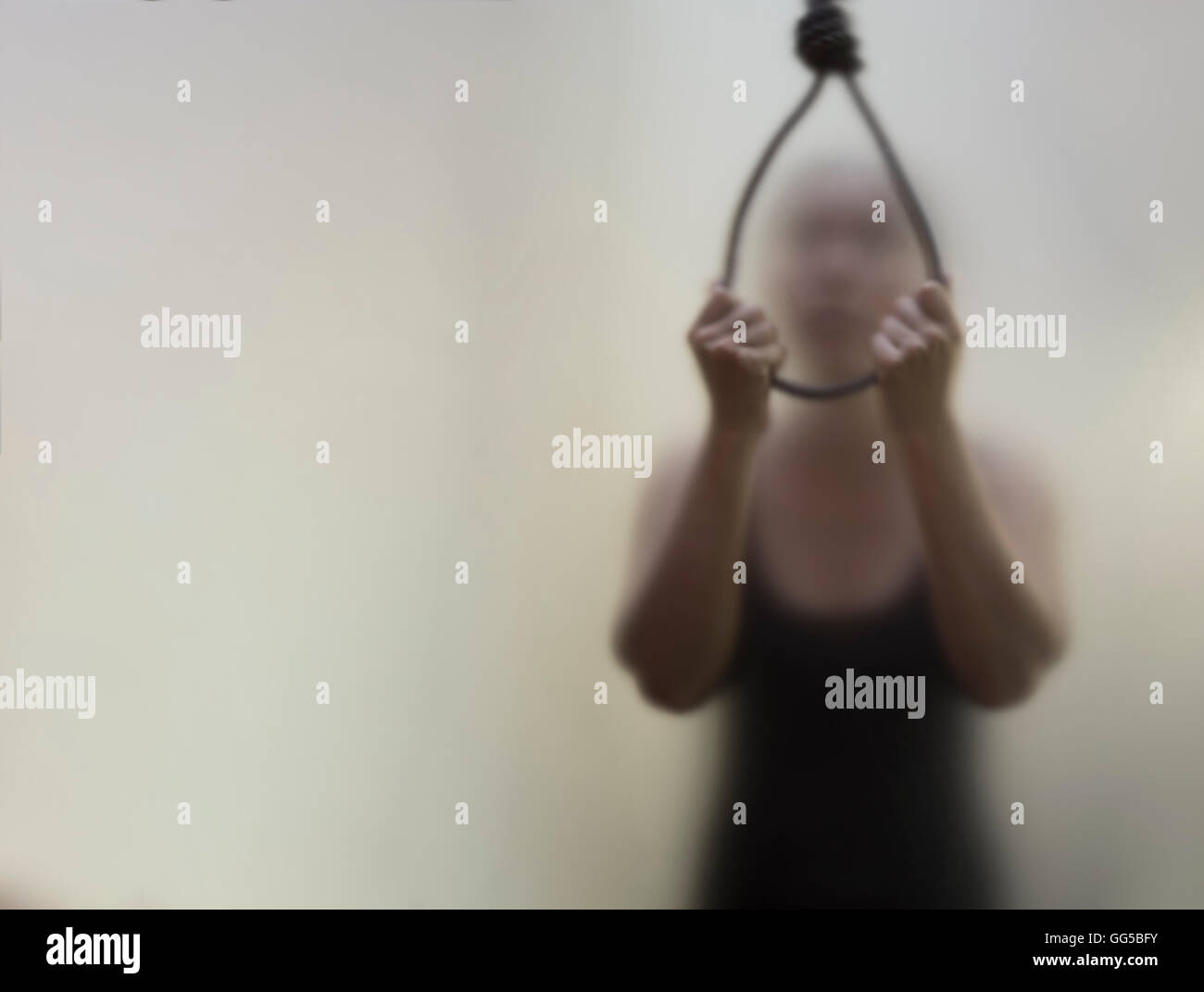 A woman hanging suicide. , Blur and noise concept. Stock Photo