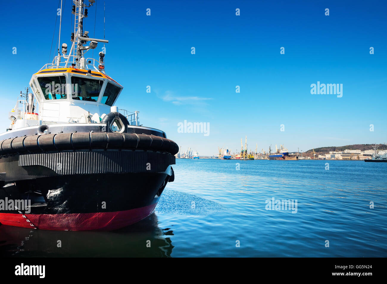 Tug boat in harbor Stock Photo