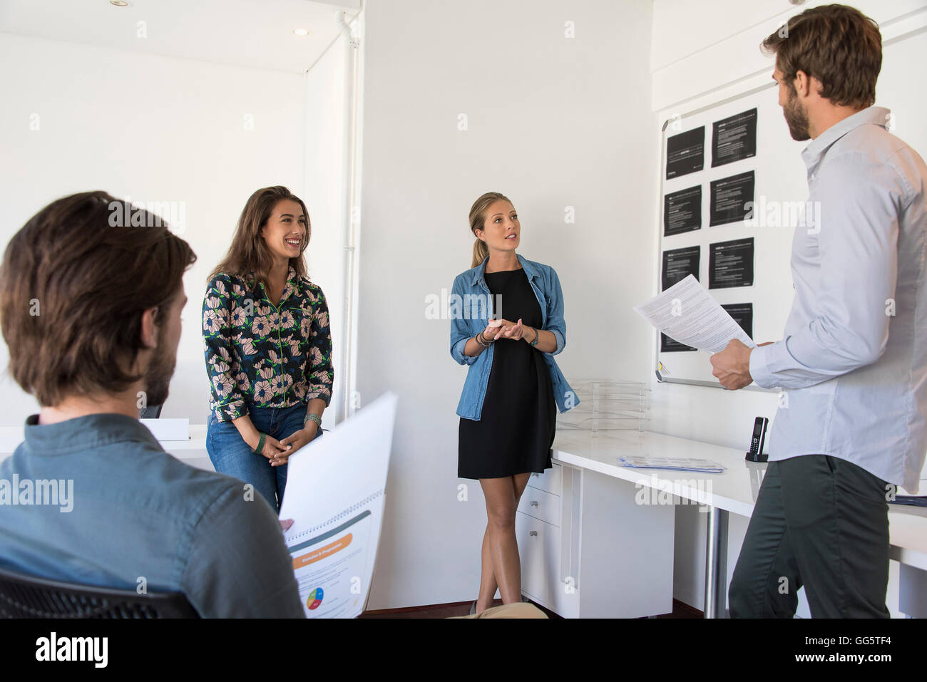 Business executives discussing in a meeting Stock Photo