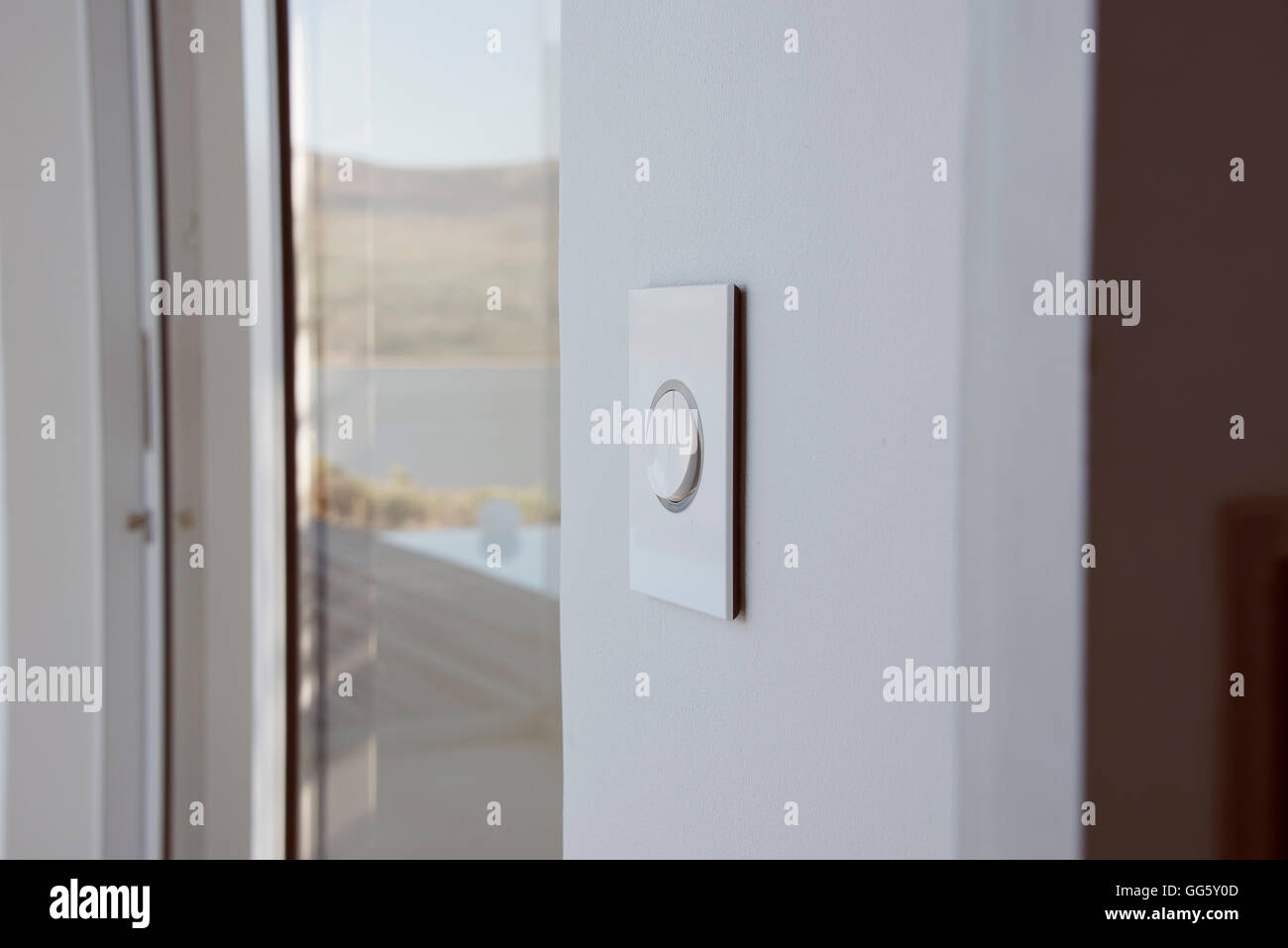 Door buzzer on modern glass doorway Stock Photo