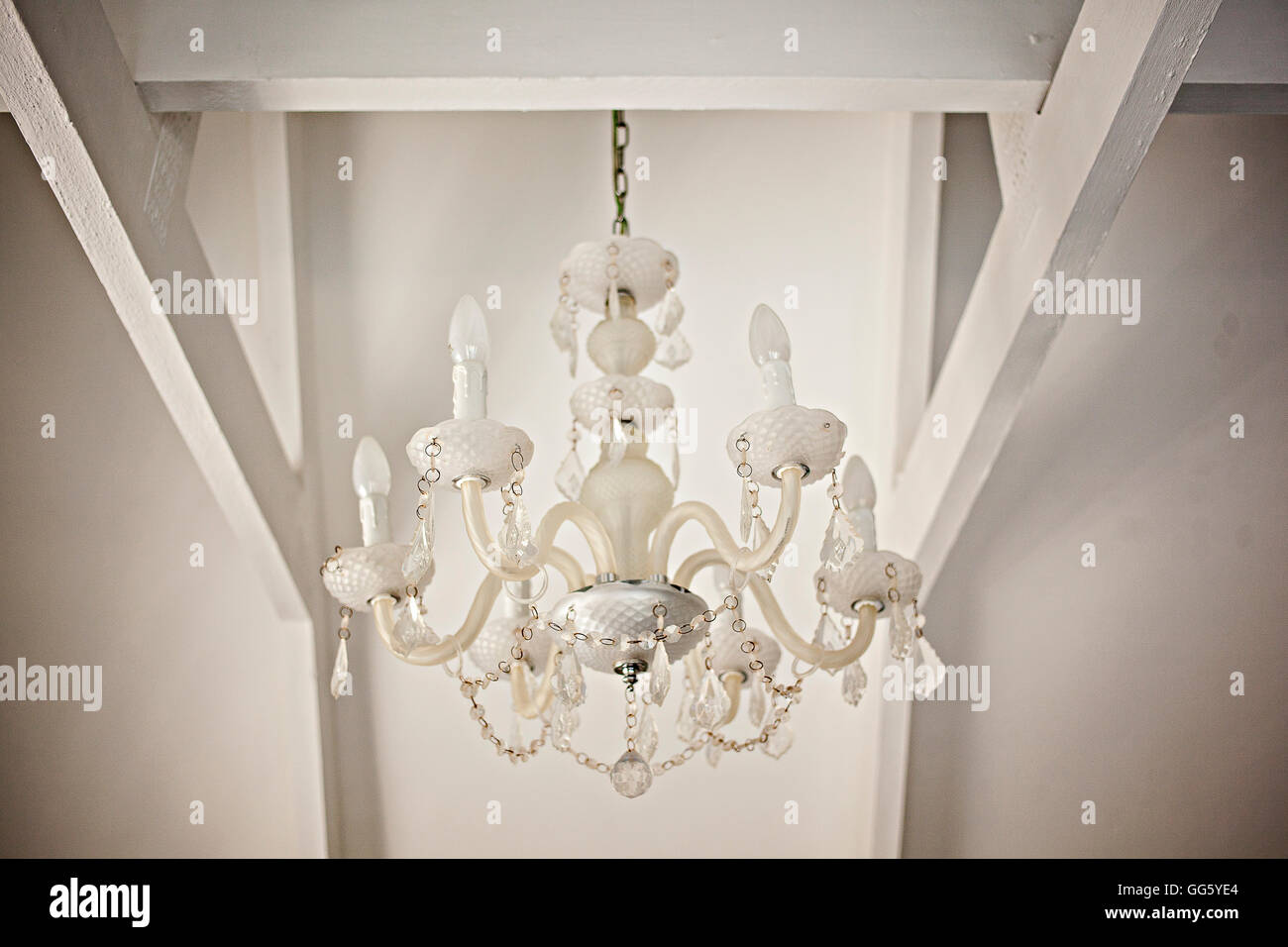 Low angle view of chandelier hanging from ceiling Stock Photo
