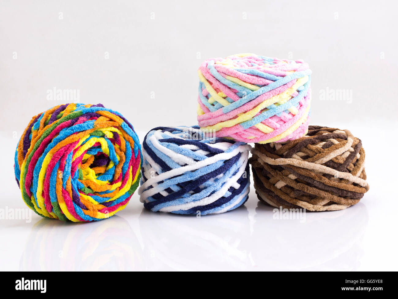 Colorful balls of woolen yarn isolated on white background Stock Photo