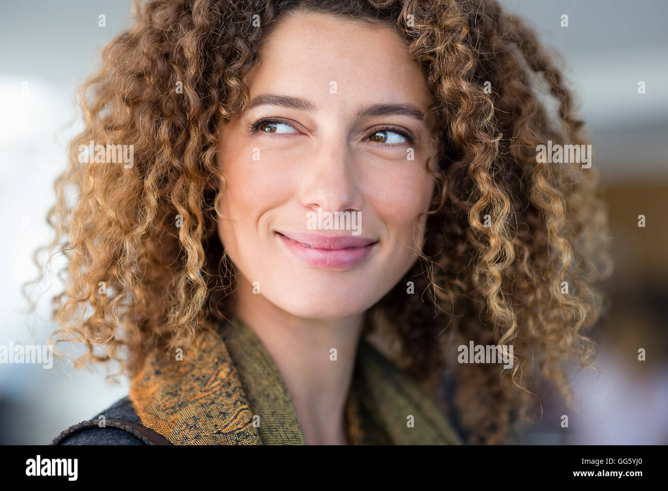 Close-up of a young woman smiling Stock Photo - Alamy