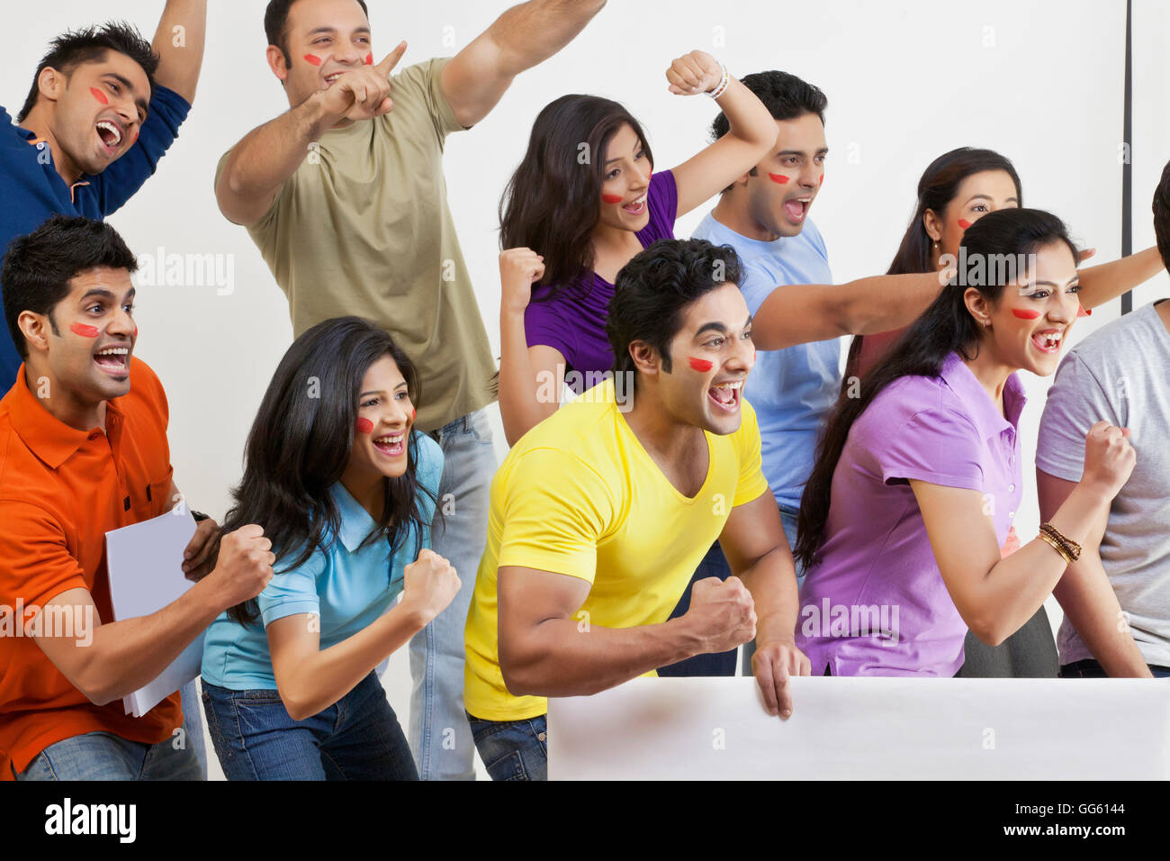 Boys and girls cheering Stock Photo - Alamy