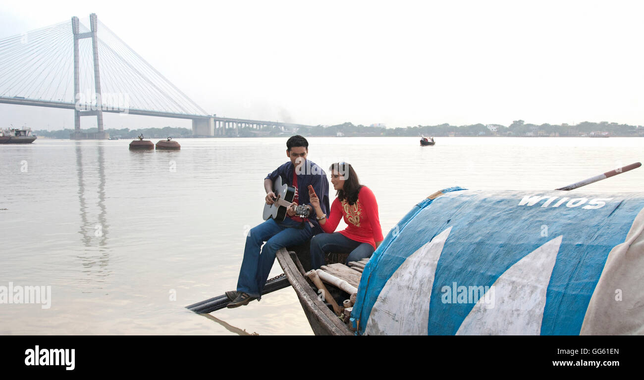 Indian boy sitting on boat hi-res stock photography and images - Alamy