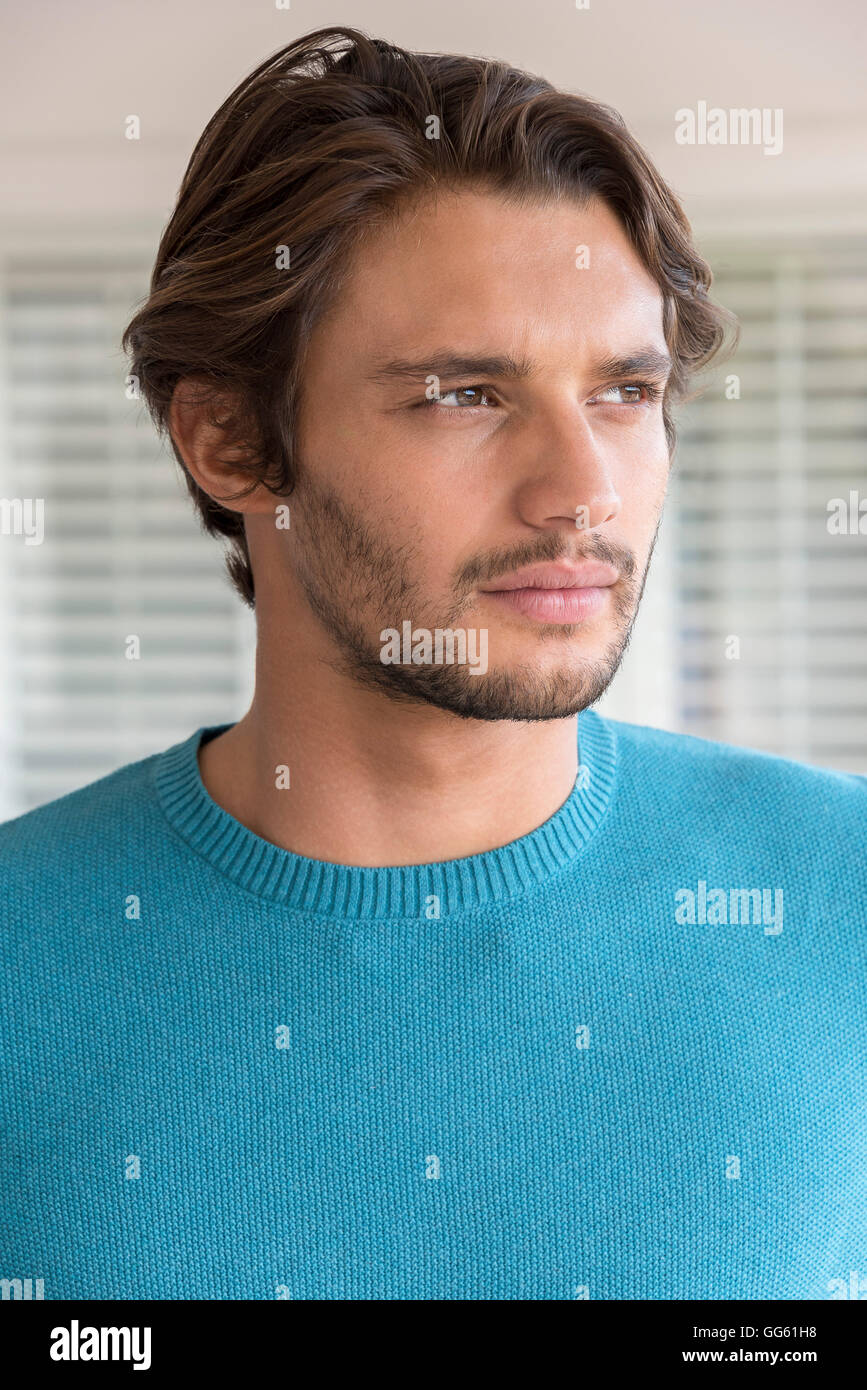 Portrait of a happy young man Stock Photo - Alamy