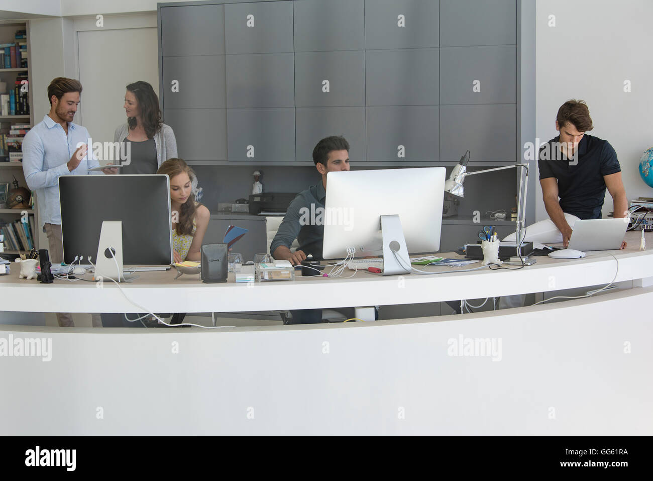 Group of business people working in office Stock Photo - Alamy