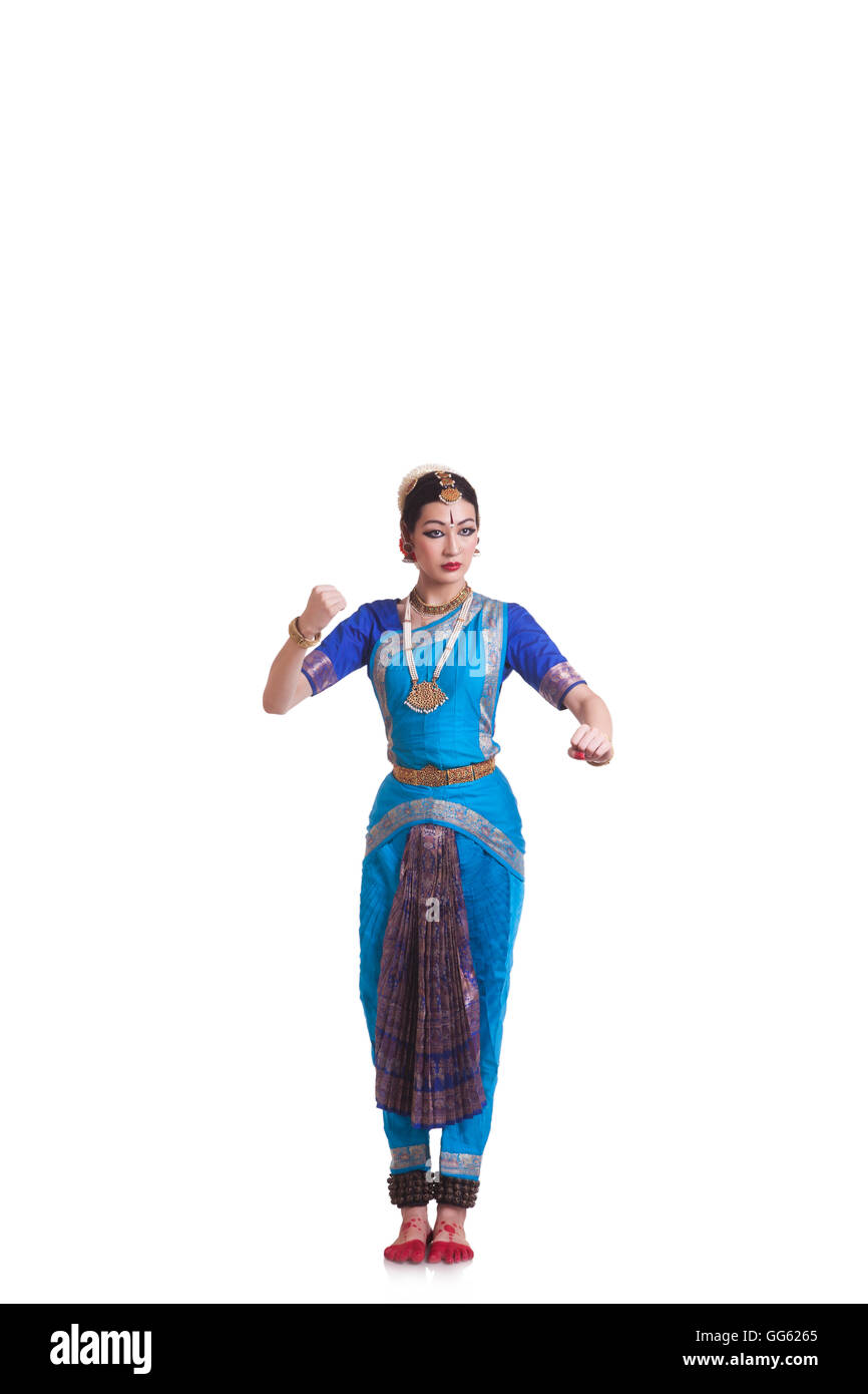Full Length Of Dancer Gesturing While Performing Bharatanatyam Against