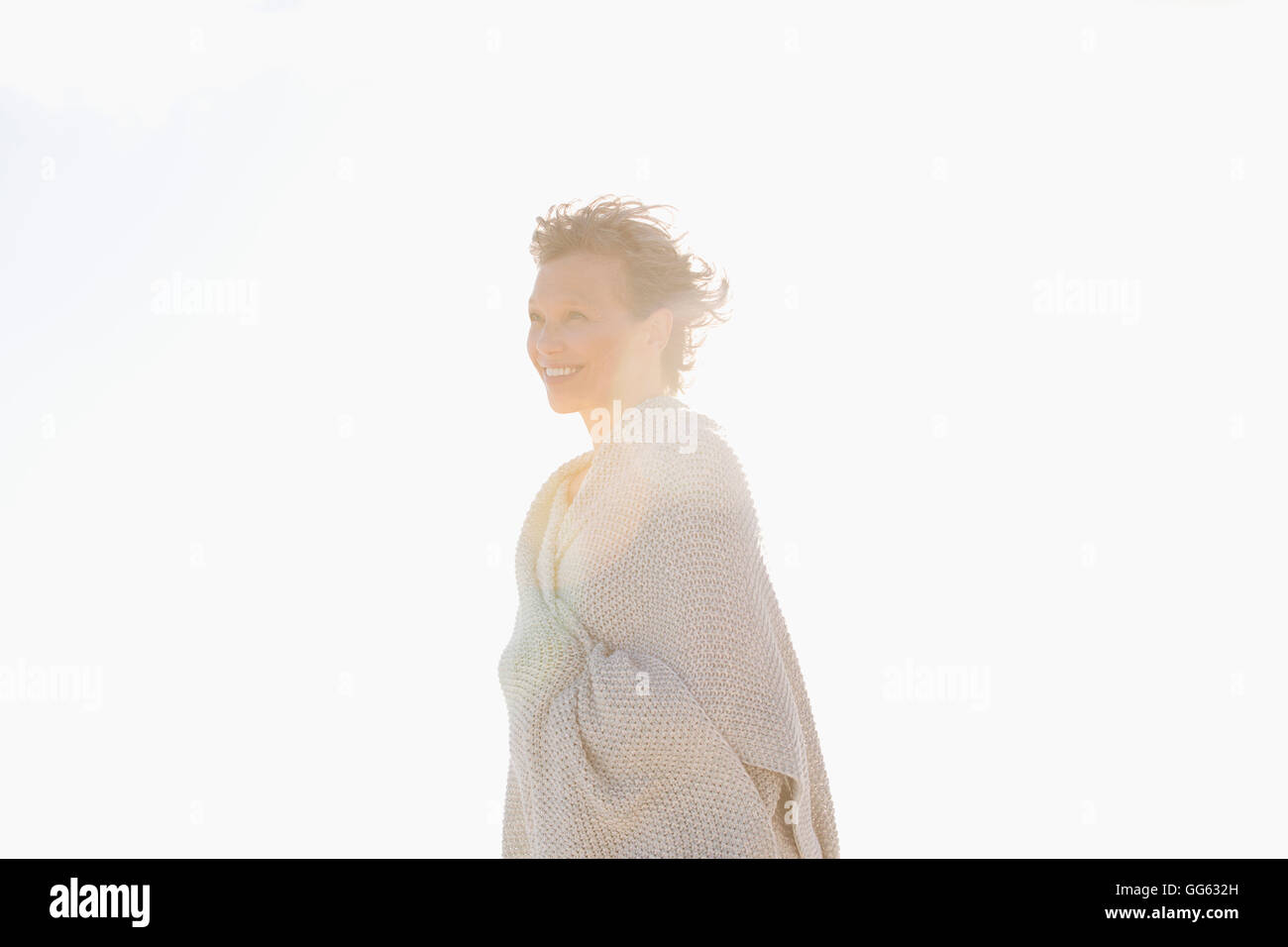 Side profile of a woman smiling Stock Photo