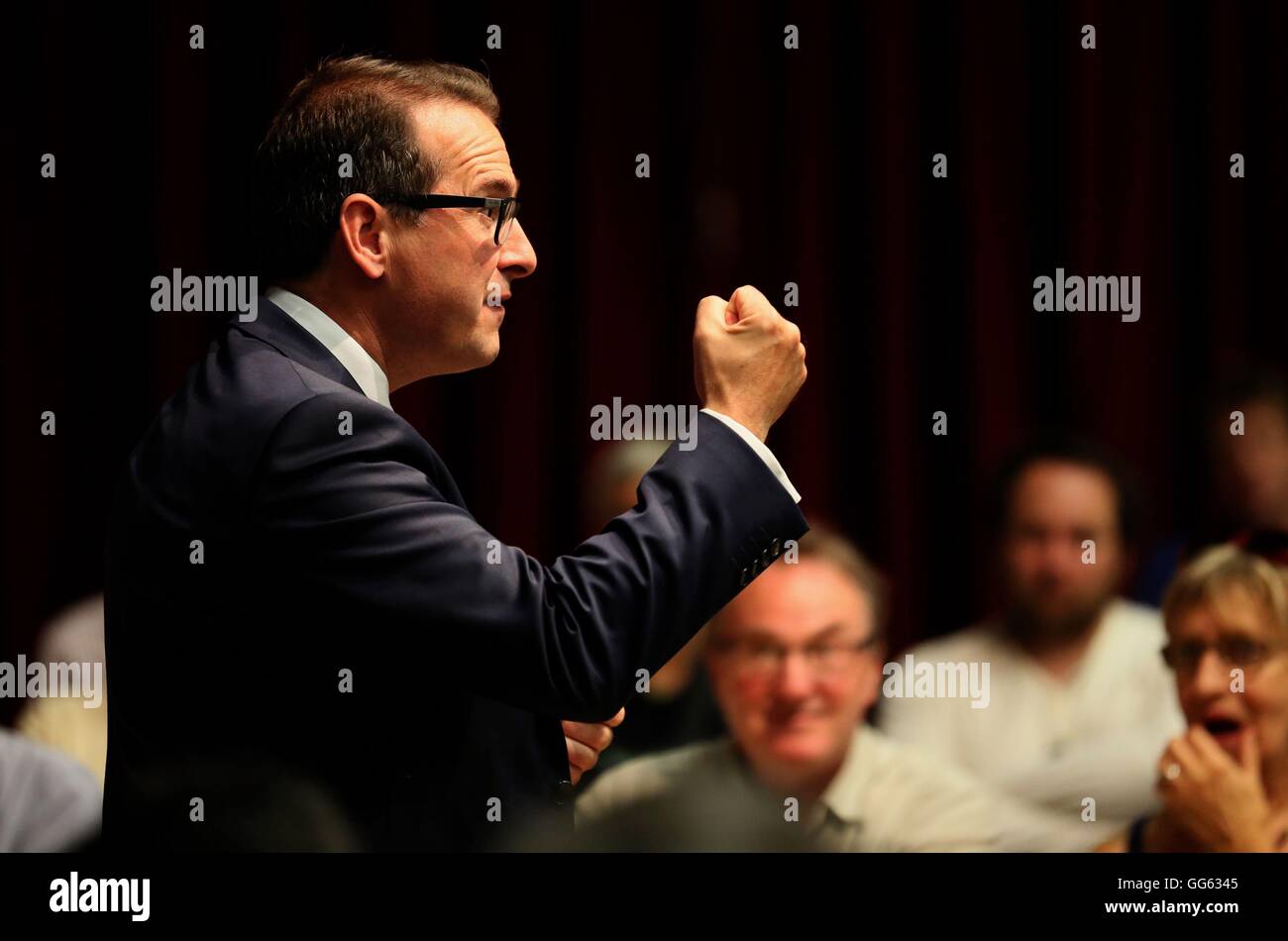 Labour leadership contender Owen Smith delivers a speech at the Open University in Milton Keynes, where he promised to reverse Conservative cuts set to leave millions of low paid workers thousands of pounds a year worse off. Stock Photo