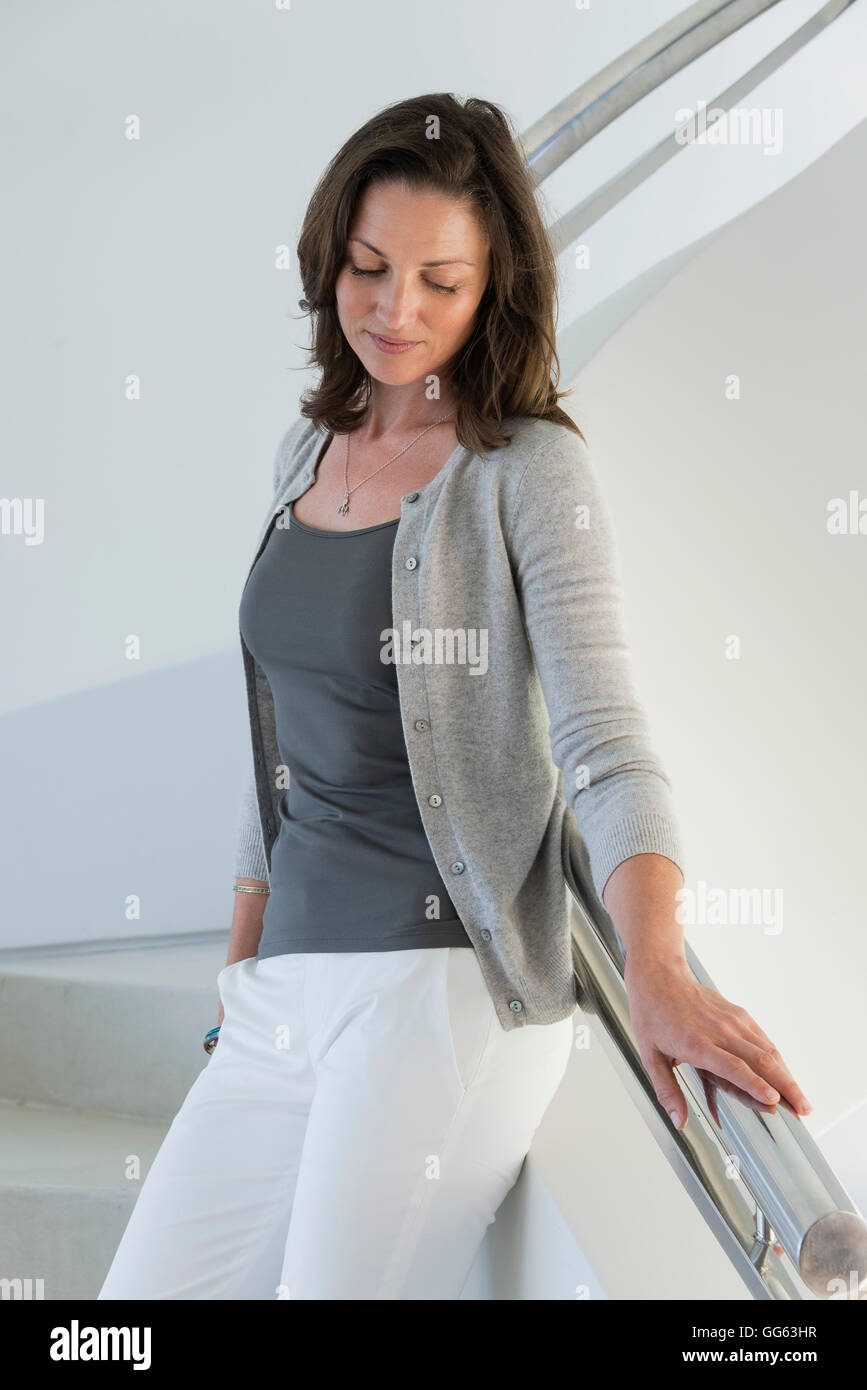 Beautiful woman standing in hi-res stock photography and images - Alamy