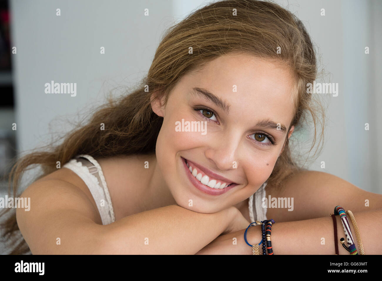 Portrait of a teenage girl smiling Stock Photo - Alamy