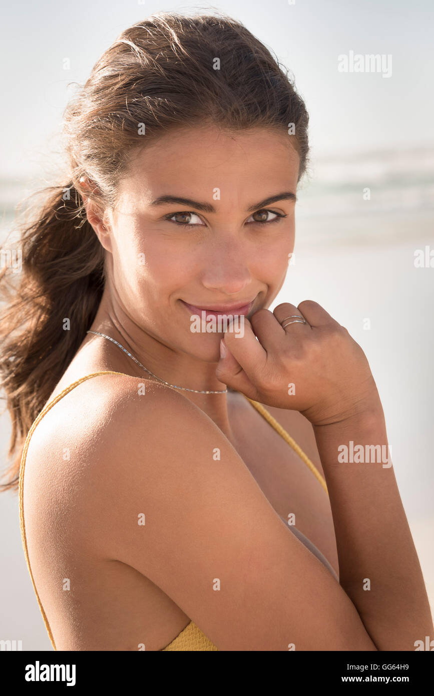Young beautiful woman smiling Stock Photo - Alamy