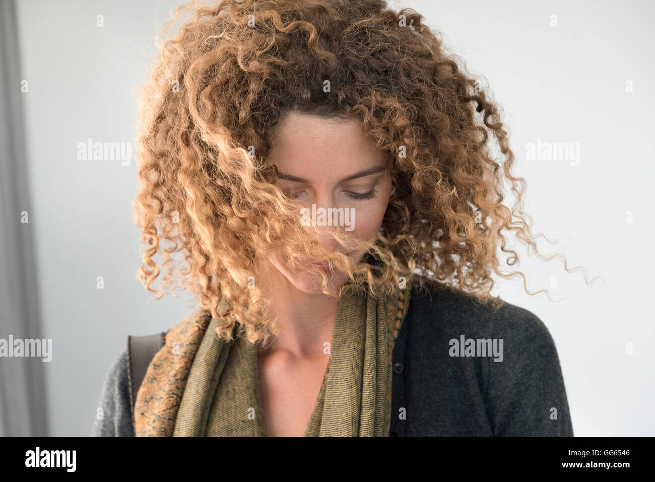 Beautiful woman curly brown hi-res stock photography and images - Alamy