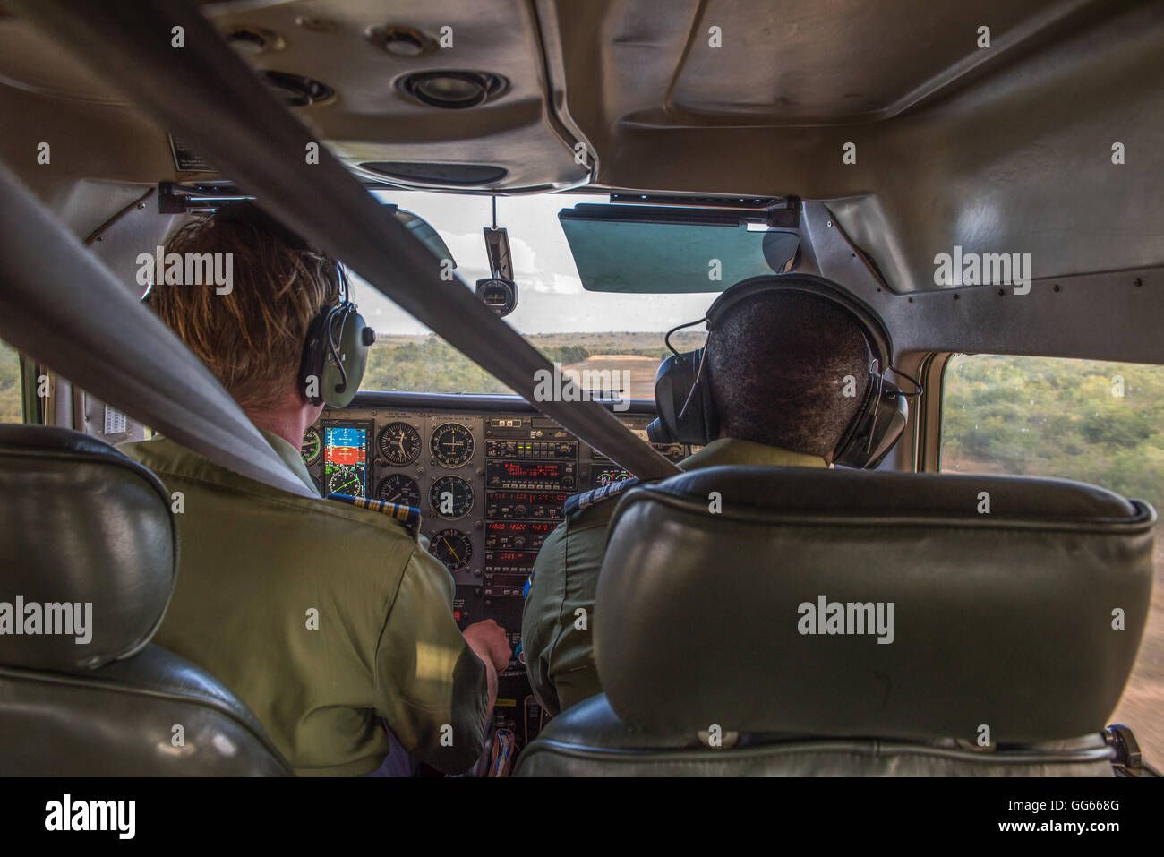 Pilots landing a light aircraft at Sumbazi Airstrip Stock Photo