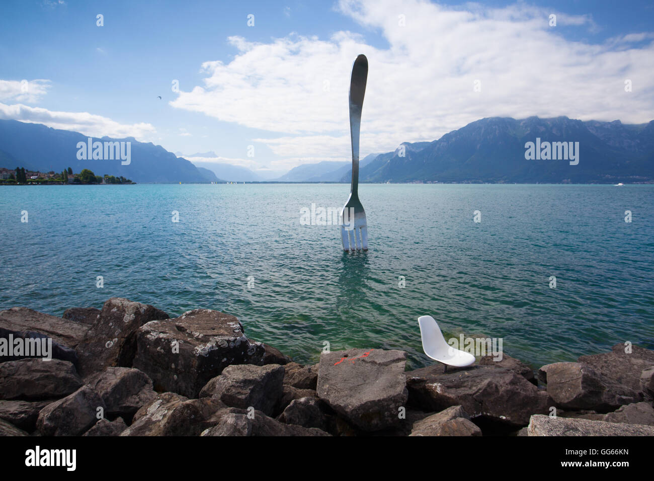 Vevey, Switzerland - July 8,2015: Giant steel fork in water of Geneva lake, Vevey, Switzerland.The fork went up in 1995 to mark Stock Photo