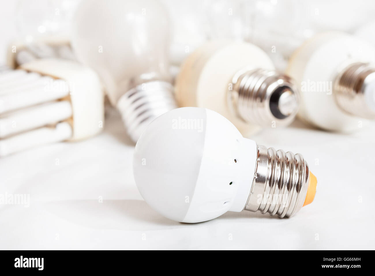 energy saving new LED lamp and many old incandescent light bulbs and ...