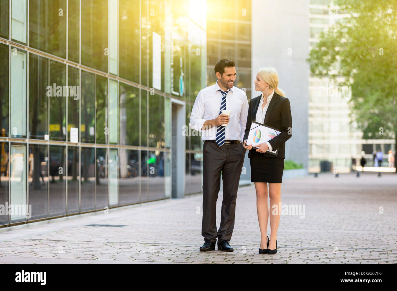 Business people having a coffee break in financial district Stock Photo