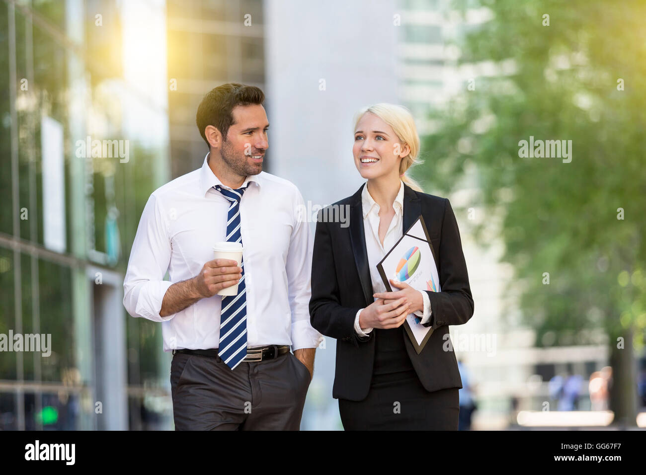 Business people having a coffee break in financial district Stock Photo