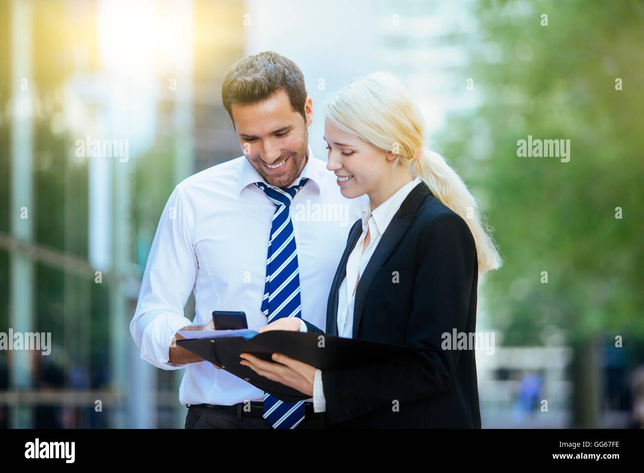 Business people meeting in financial district Stock Photo