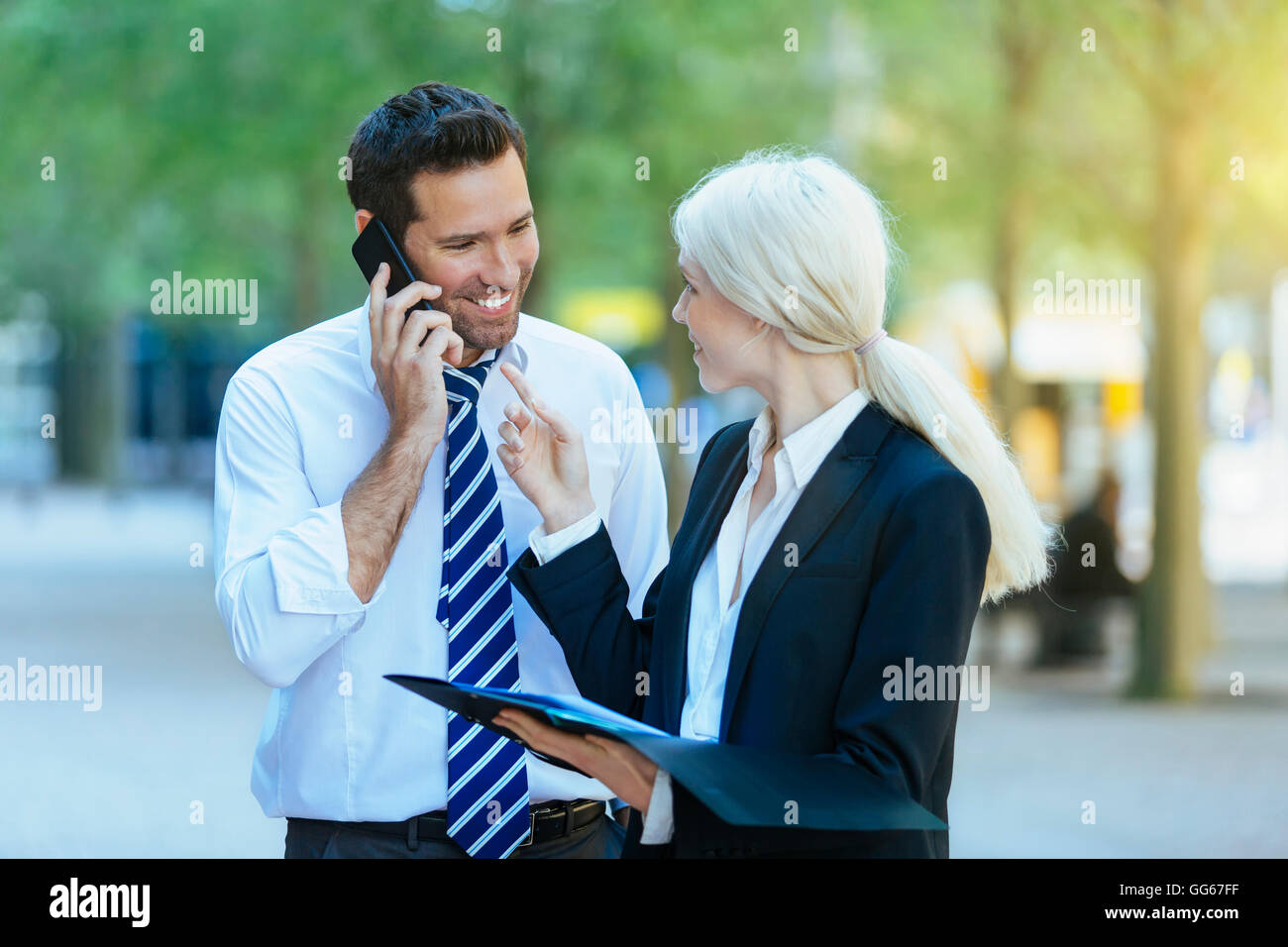 Business people meeting in financial district Stock Photo