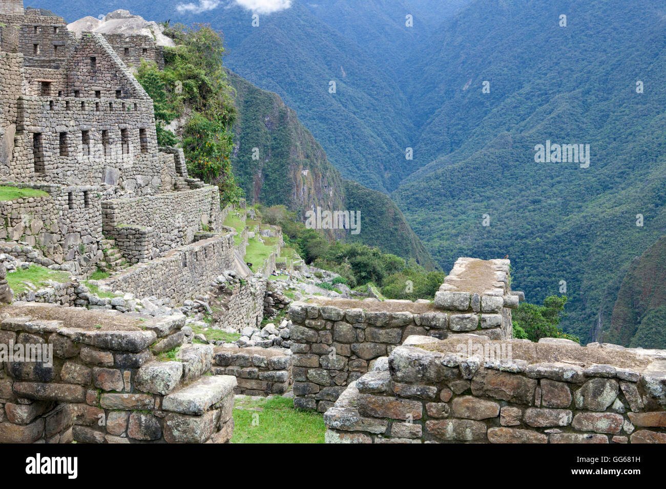 Inca stone houses at Machu Picchu in Peru Stock Photo - Alamy