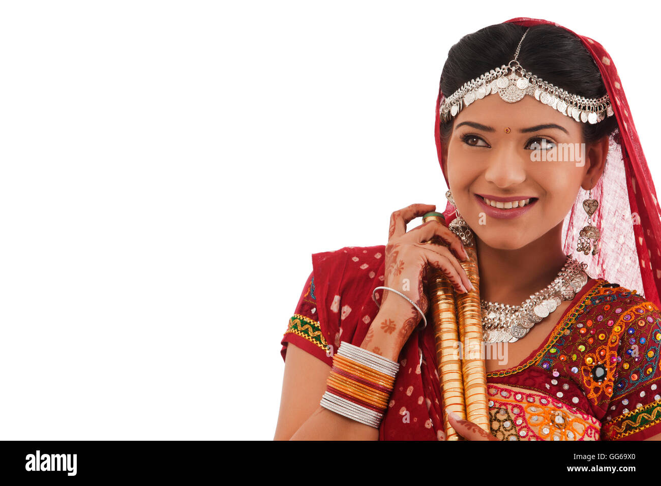 Female dandiya dancer with sticks Stock Photo - Alamy