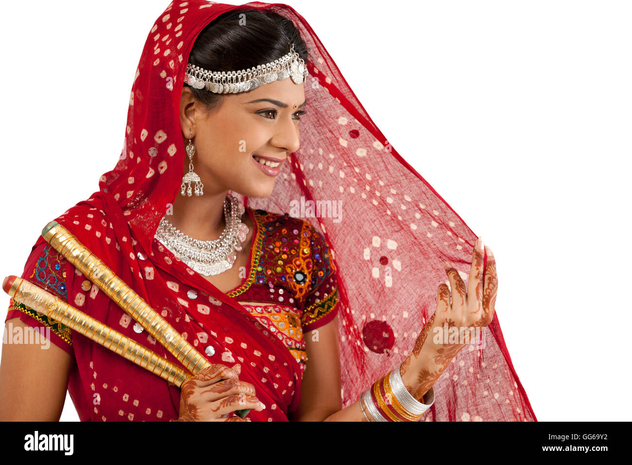 Female dandiya dancer with sticks Stock Photo - Alamy
