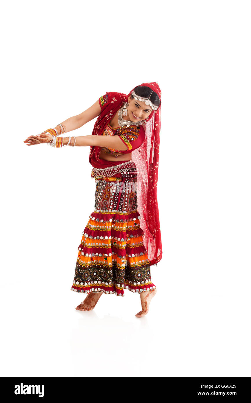 Female dandiya dancer dancing Stock Photo - Alamy
