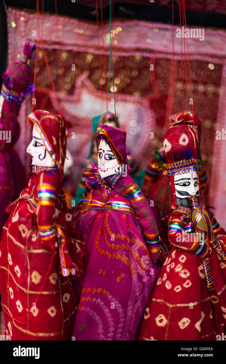 Colorful puppets hanging in a shop in Udaipur, Rajasthan, India, Asia Stock Photo
