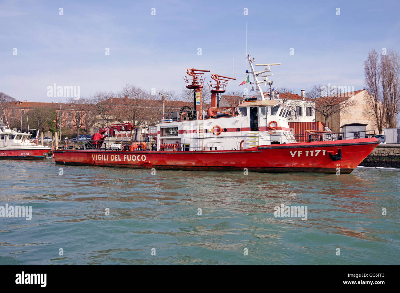 Venice Italy Fire boat moored near Commercial port Stock Photo
