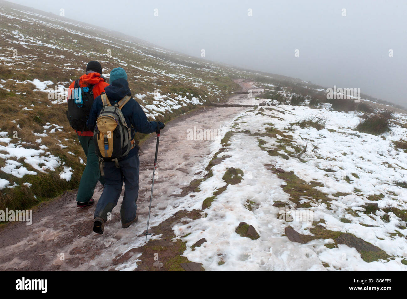 Hikers descend from Pen-Y-Fan summit in The Brecon Beacons National Park, Powys, Wales, United Kingdom, Europe Stock Photo