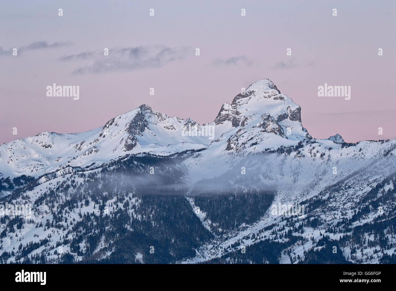 Tetons at dawn in the winter, Grand Teton National Park, Wyoming, United States of America, North America Stock Photo