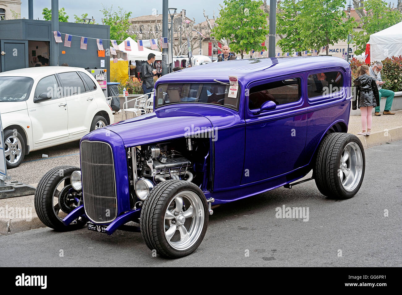 purple hot rod parked in a gathering of American motorcycles in Beaucaire in the French department of Gard Stock Photo