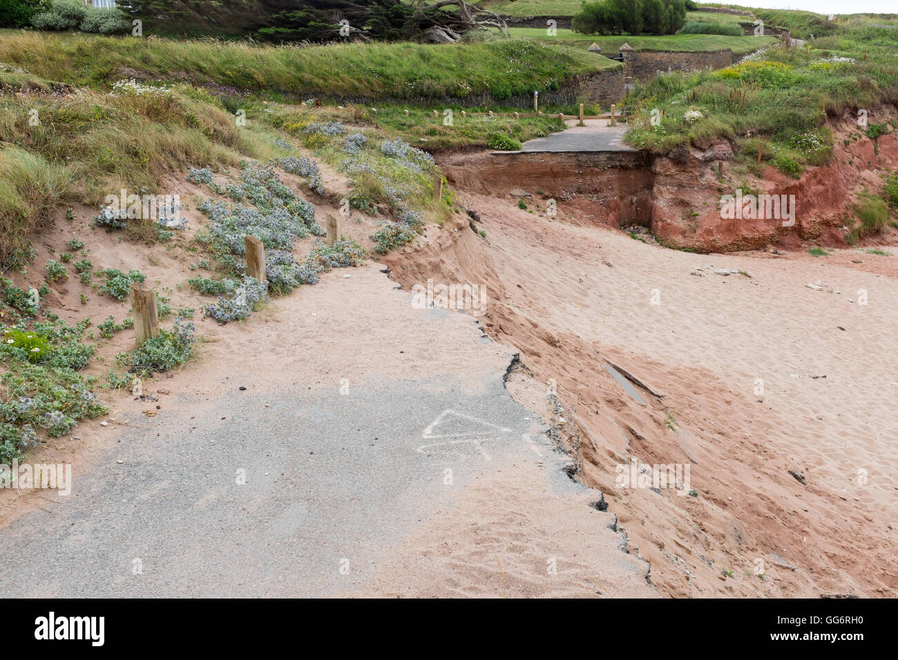 Collapsed road caused by coastal erosion on the South Devon coastline Stock Photo