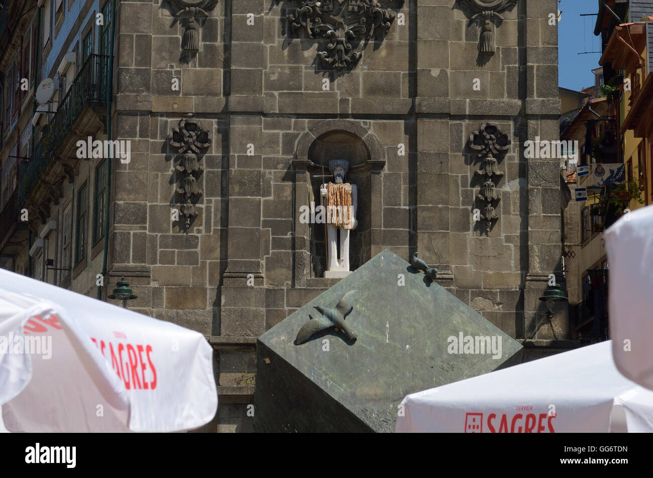 Statue of St John the Baptist and cubic sculpture in Ribiera Square. Porto. Oporto. Portugal. Europe Stock Photo