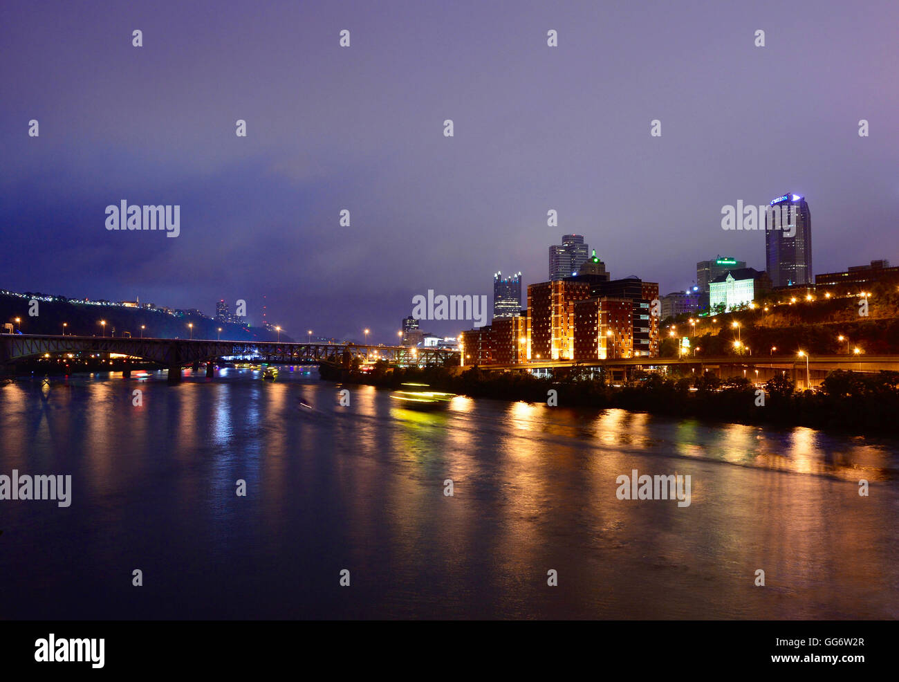 View of downtown Pittsburgh, Pennsylvania, and the Monongahela River from the 10th Street Bridge at night Stock Photo