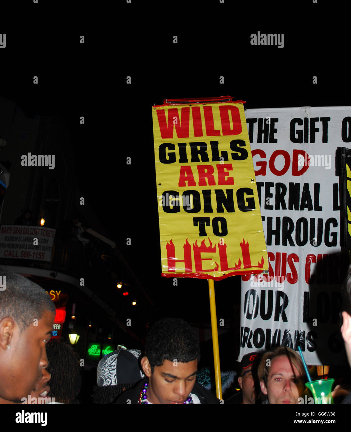 Protesters on Bourbon Street warning revelers about Gods judgment during Mardi Gras New Orleans Louisiana Stock Photo