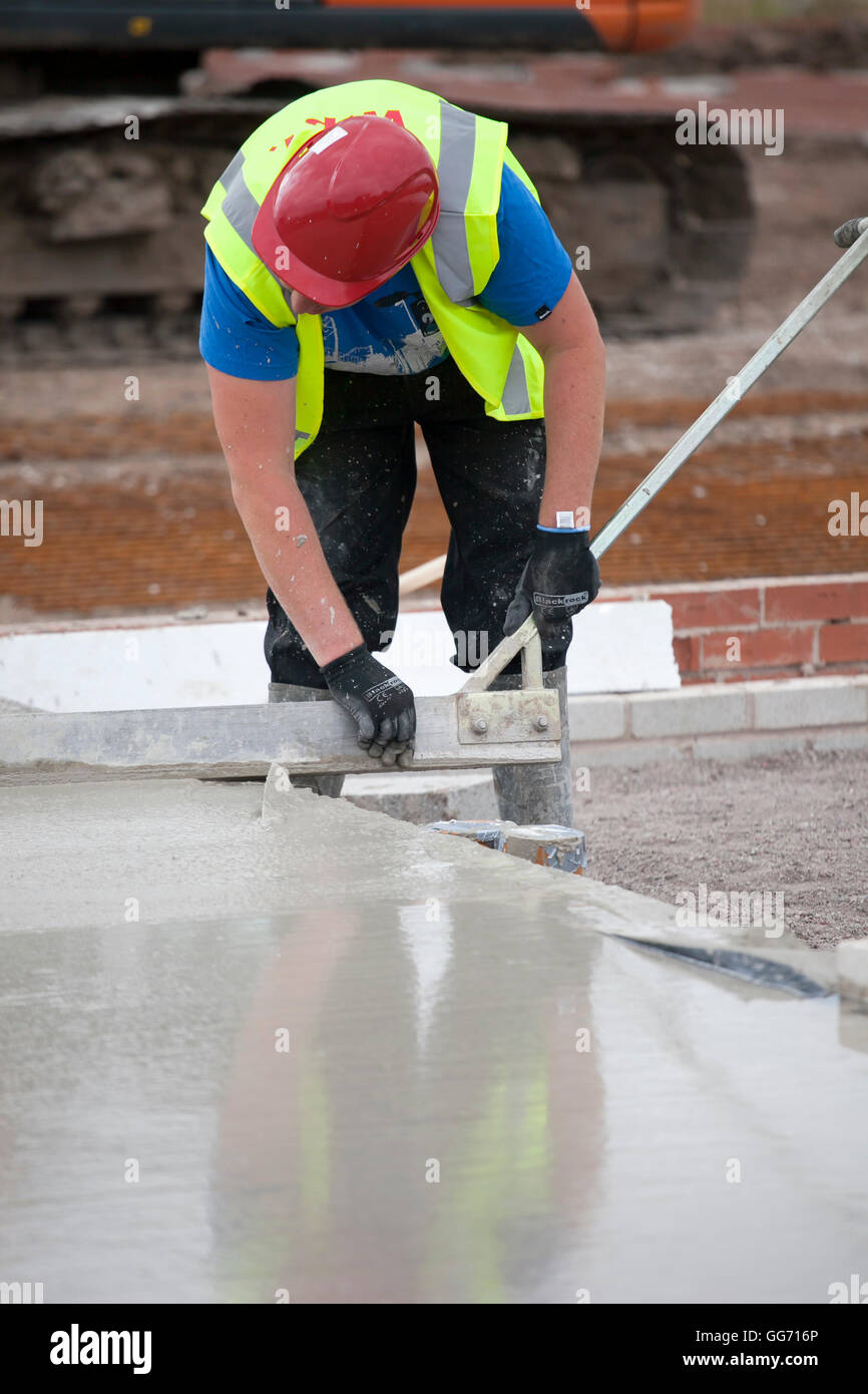 Concrete bases, infill construction, Ground-bearing floors being filled, new housing building development, Buckshaw village, Chorley, Lancashire, UK Stock Photo