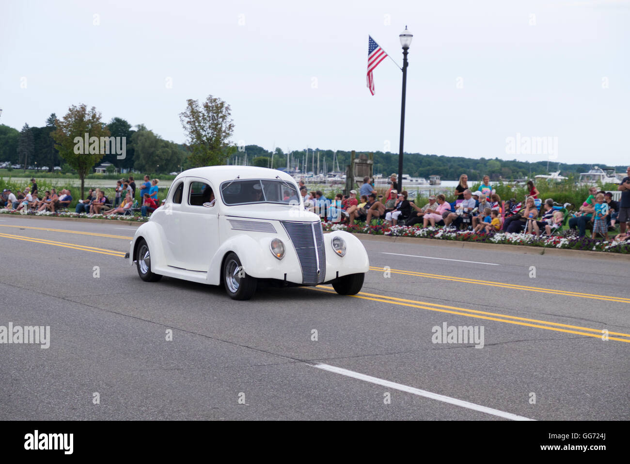A vintage Chevrolet 2-door coupe participates in the 2016 Annual Cruz In Parade through Whitehall and Montague, Michigan. Stock Photo