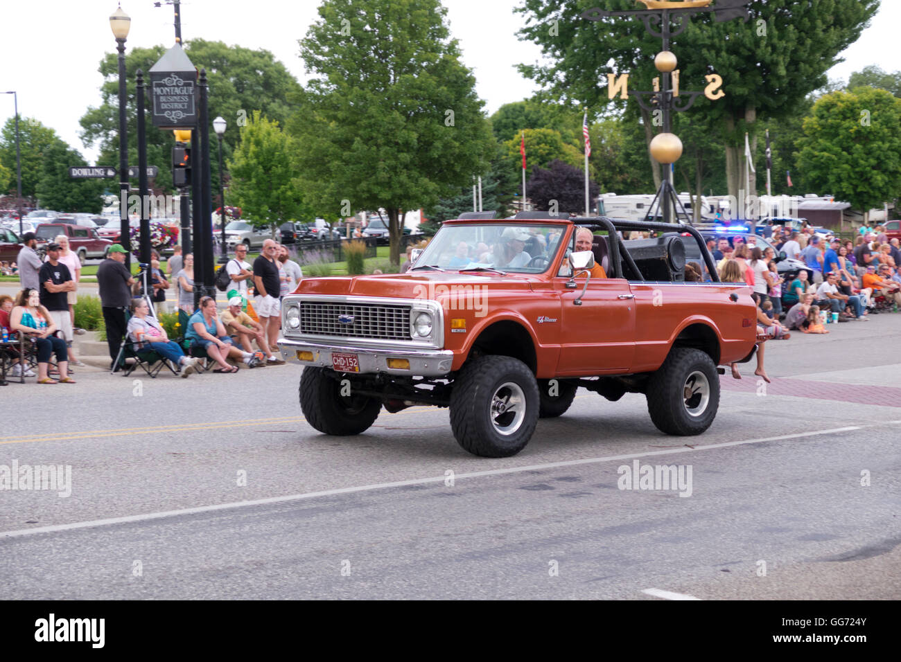 A 1971 Chevrolet Blazer rolls in the 2016 Annual Cruz In Parade through downtown Montague, Michigan. Stock Photo