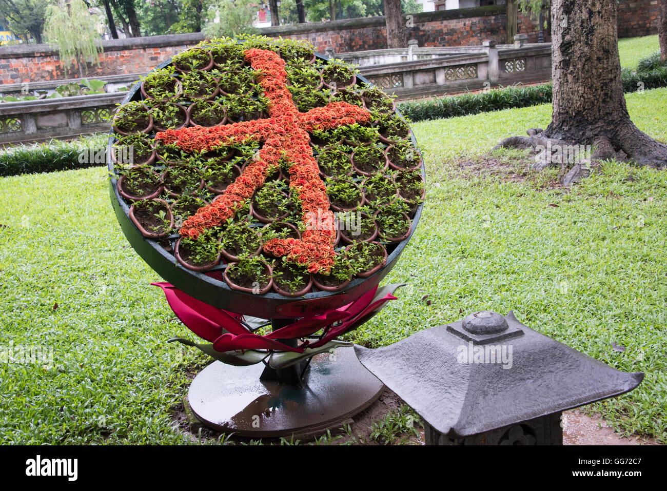 Vietnamese character formed from plants in pots at temple in Hanoi