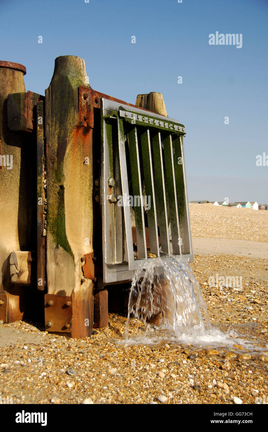 Outlet pipe on beach Stock Photo Alamy
