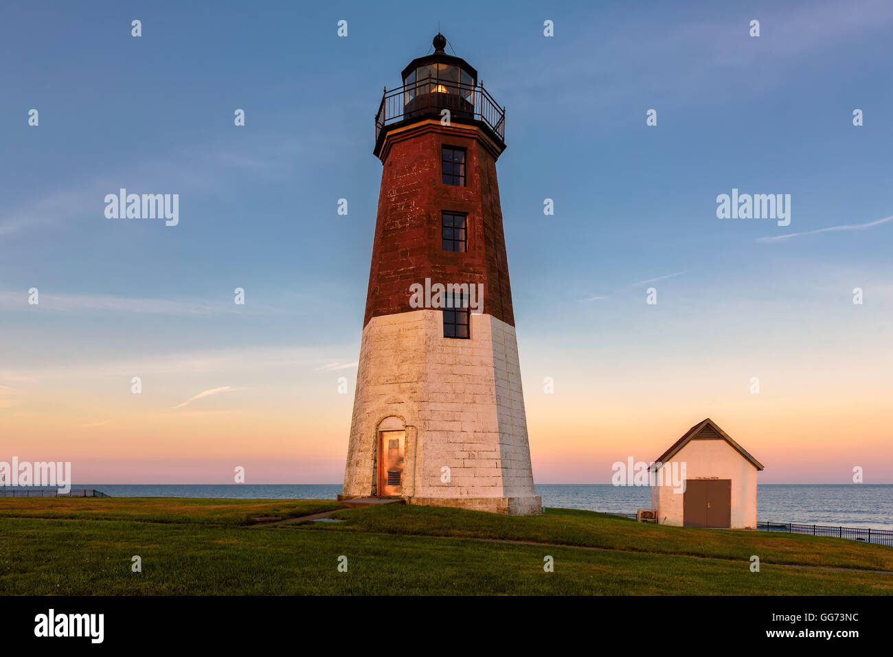 Point Judith lighthouse at sunset Stock Photo