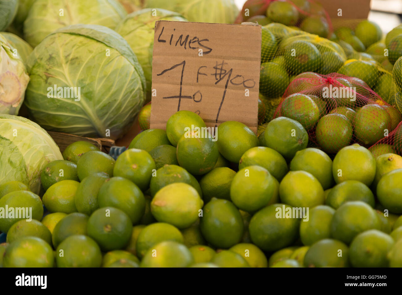 A close up photograph of some limes for sale in a market in Boston, USA ...