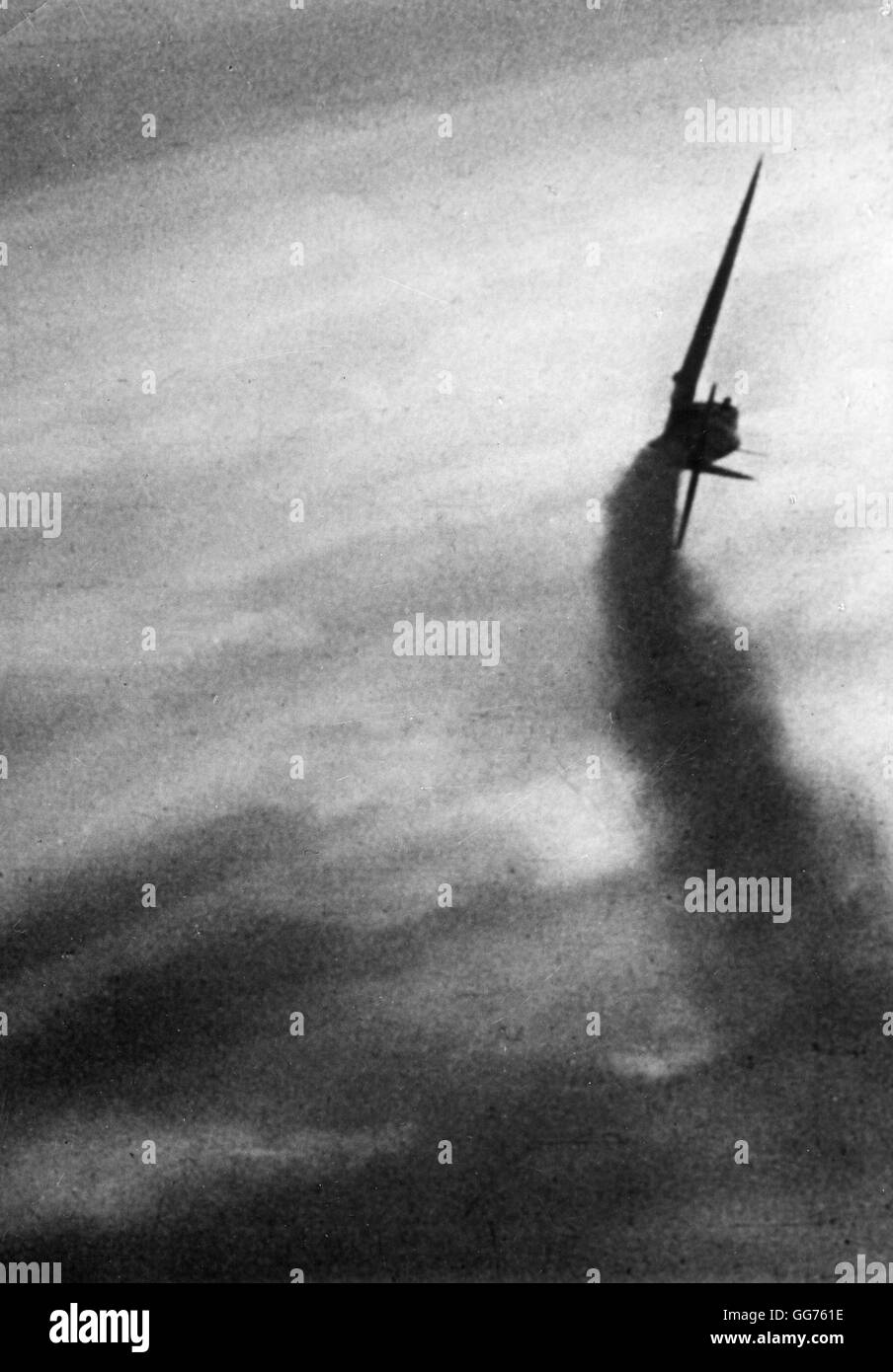 During Battle of Britain - A damaged British aircraft crashing to earth during an air battle over Britain. Stock Photo