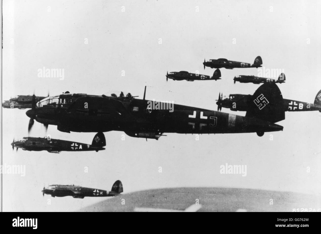 German Heinkel He111s roar over the English Channel with full bomb loads on a mission in England. Stock Photo