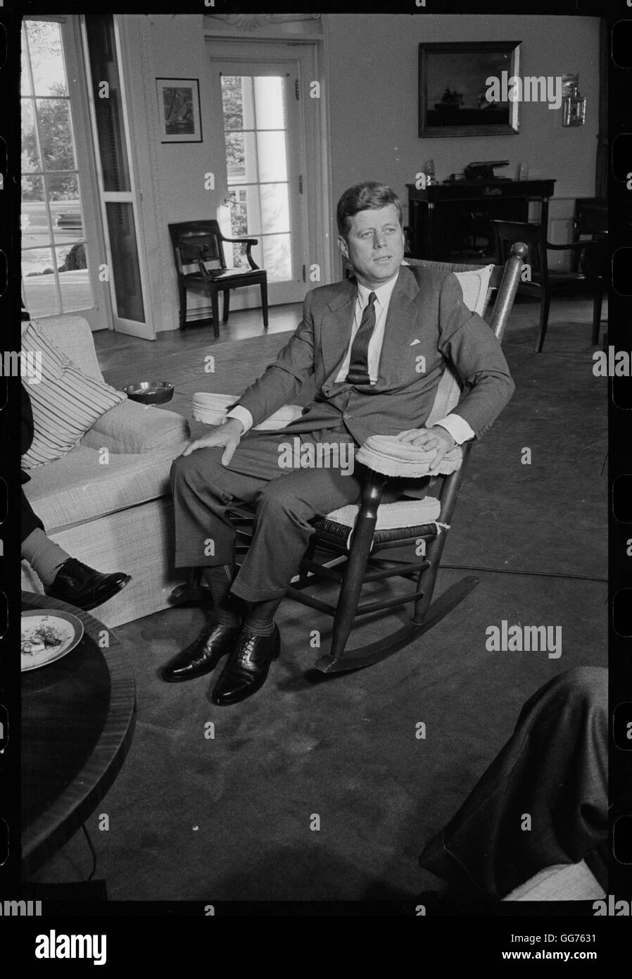 John F Kennedy Sitting In His Rocking Chair In The Oval Office